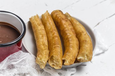 Churros sıcak çikolata ile