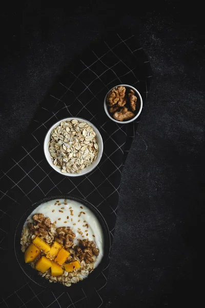 Bowl of homemade granola with yogurt and cereals