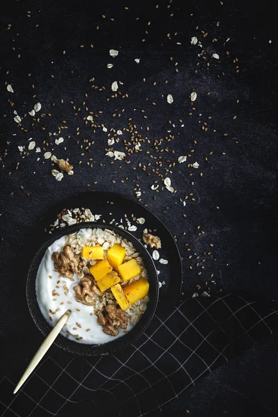 Bowl of homemade granola with yogurt and cereals