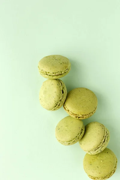 Homemade Green Macarons Seen Green Background Flat Lay — Stock Photo, Image