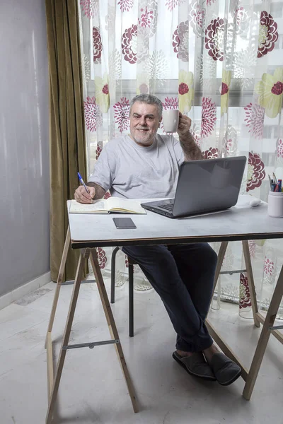 Mature Man Beard Working Home Pajamas Laptop Mobile Phone Coronavirus — Stock Photo, Image