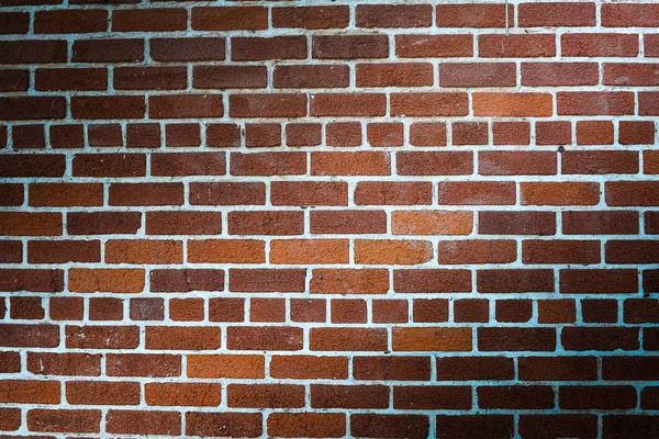 Stained old brick wall background