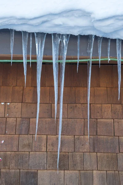 Ice icicles on the roof — Stock Photo, Image