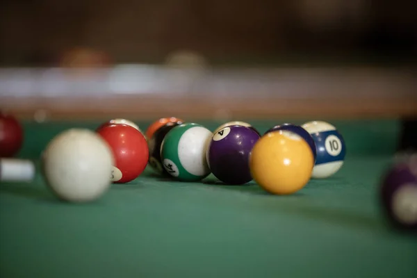 Sports game of billiards on a green cloth. Billiard balls with n — 스톡 사진