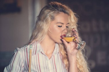 Young people playing snooker