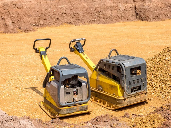 Vibratory plate on a construction site — ストック写真