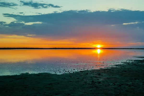 Waddenské moře při západu slunce — Stock fotografie