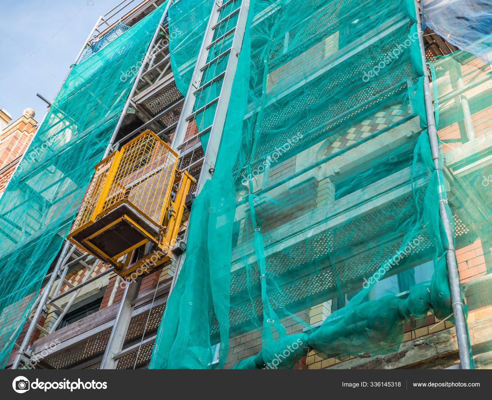 Scaffolding with freight elevator — Stock Photo © Animaflora-PicsStock