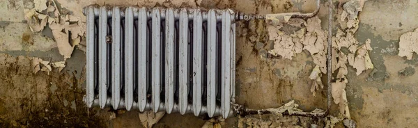 Panorama Old heating after water damage — Stock Photo, Image