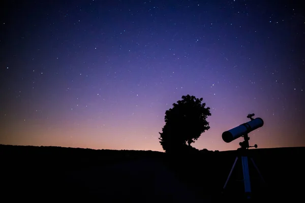 Looking into the stars with the telescope