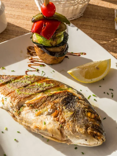 Grilled fish in the restaurant — Stock Photo, Image