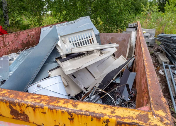 Containers with metal scrap on the recyclable material — Stock Photo, Image