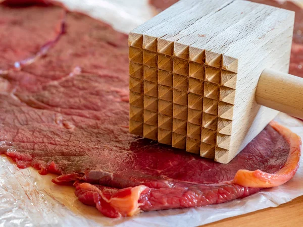 Meat tenderizer and red meat — 스톡 사진