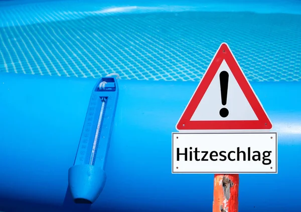 German Warning sign heat stroke symbolic — 스톡 사진