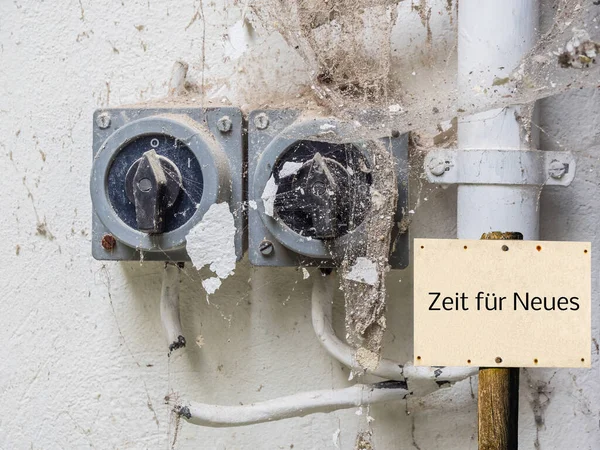 Old switch "Germany Zeit fuer Neues" sign — Stock Photo, Image