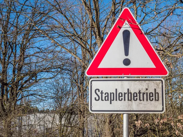 Warning sign stacker operation in German — Stok fotoğraf
