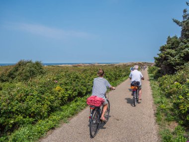 Bike tour on Sylt at the North Sea clipart