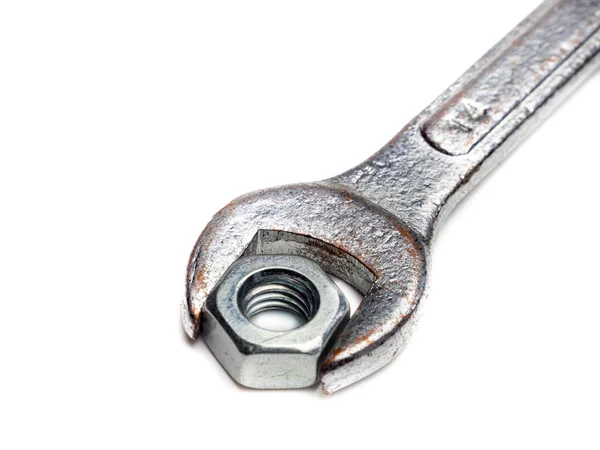 Wrench with nut isolated background — 스톡 사진