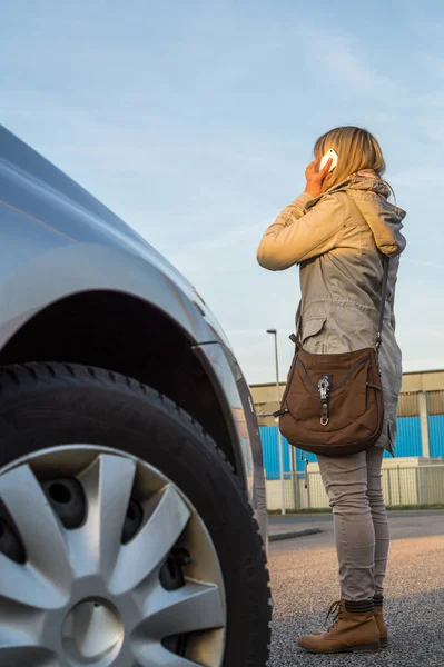 Woman doesn't pay attention to traffic because she's on the phon