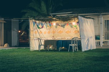Sukkah - Yahudi tatil Sukkot kutlama için sembolik geçici kulübe