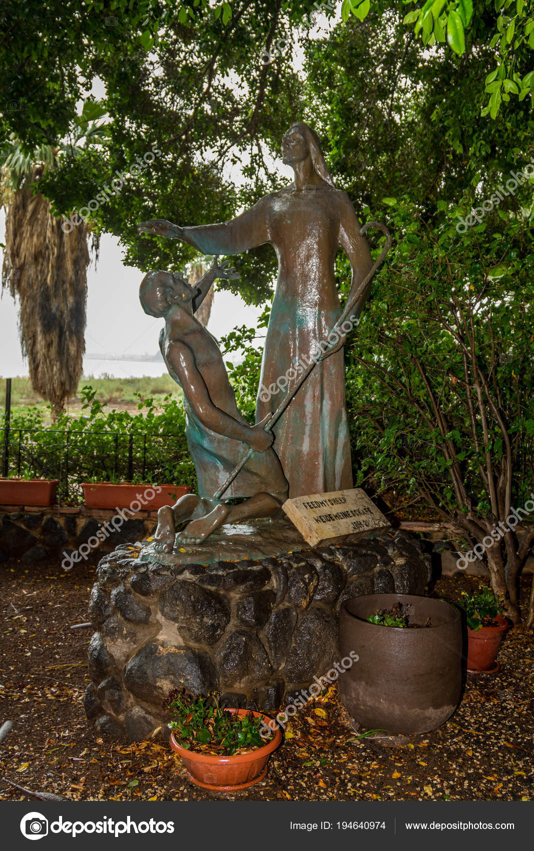 bronze sculpture of jesus and peter in the garden of church of the primacy of st peter on the coast of the sea of galilea tabgha israel photo by - Prim Garden bronze sculpture of jesus and peter in the garden of church of the primacy of st peter on the coast of the sea of galilea tabgha israel photo by - Prim Garden
