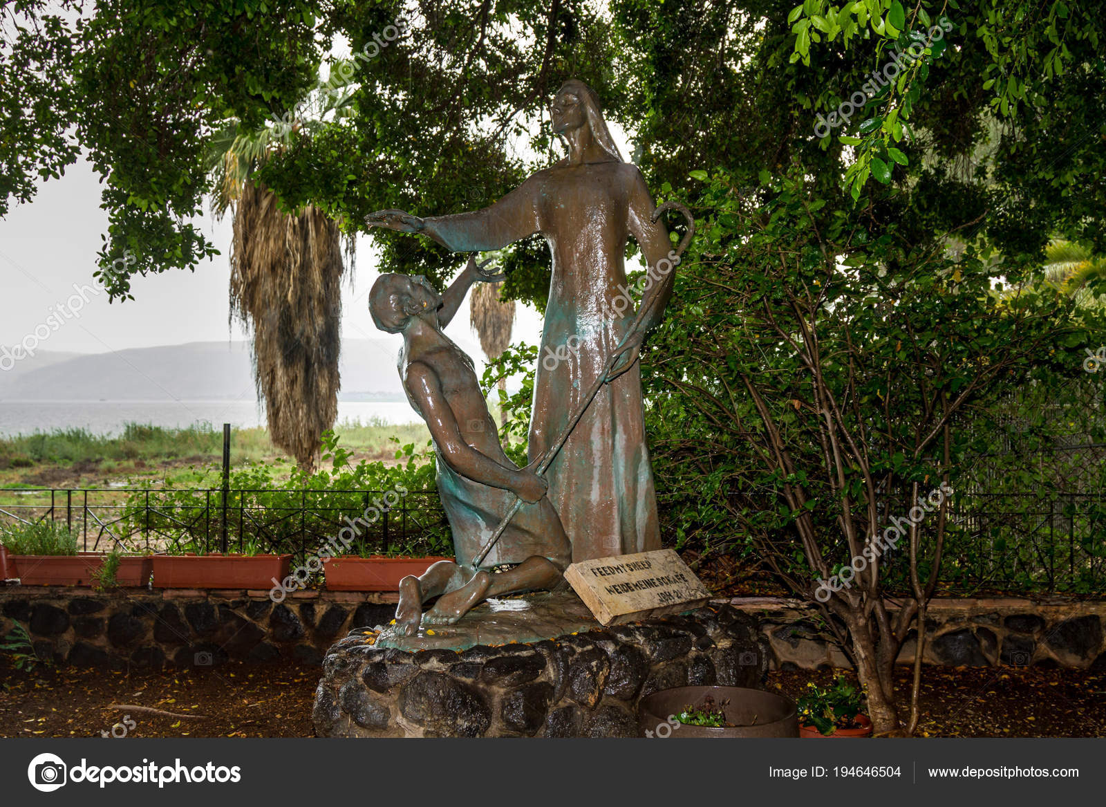 bronze sculpture of jesus and peter in the garden of church of the primacy of st peter on the coast of the sea of galilea tabgha israel photo by - Prim Garden bronze sculpture of jesus and peter in the garden of church of the primacy of st peter on the coast of the sea of galilea tabgha israel photo by - Prim Garden