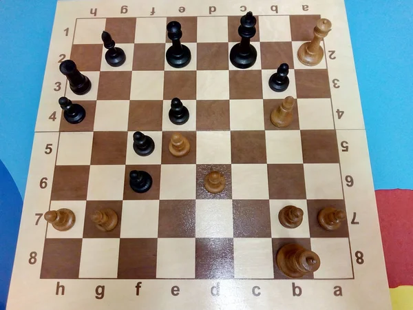 Black surrendered. Chess game. The victory of white pieces