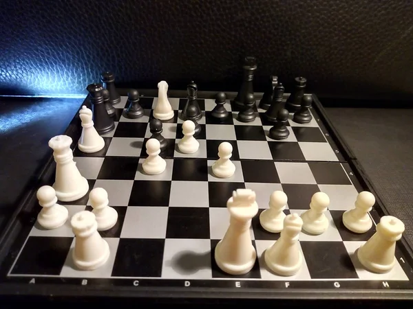 Black surrendered. Chess game. The victory of white pieces