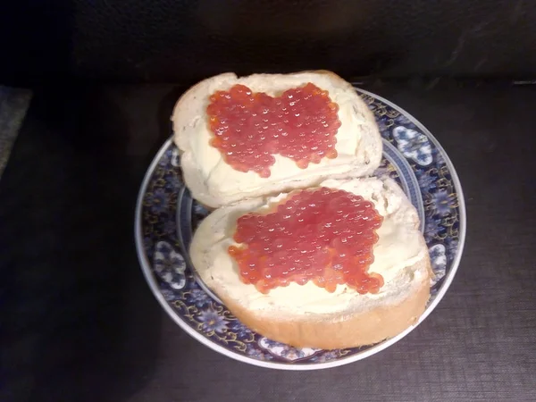 Sandwiches with coho salmon caviar. Red caviar Delicacy from the Far East