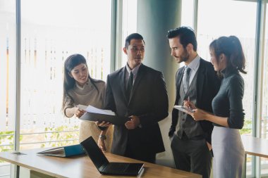 Executives and secretaries are discussing about the job informat