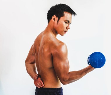Asian young man with muscular body On the white back
