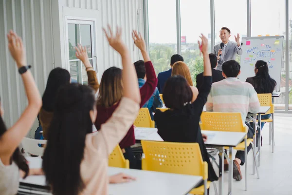 Asian male speaker is speaking at seminars and workshops to the — стокове фото