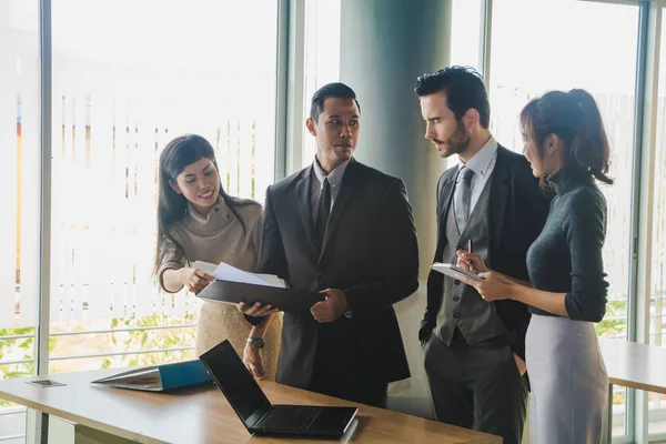 Executives and secretaries are discussing about the job informat