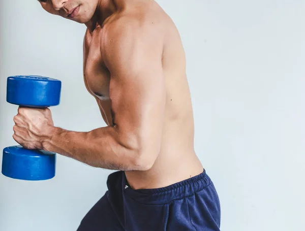 Asian young man with muscular body On the white back — Stok fotoğraf