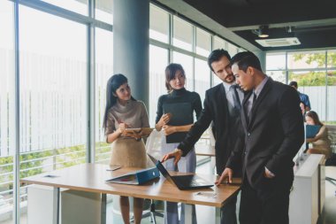 Executives and secretaries are discussing about the job informat