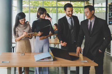 Executives and secretaries are discussing about the job informat