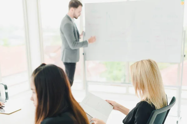 Young Businessmen Explaining Graphs Statistics Whiteboard Managers Employees Company Attending — Stock Photo, Image