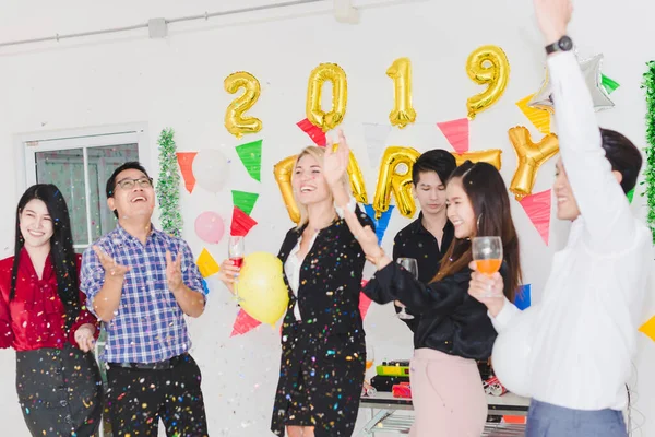 Company Employees of a party to celebrate the New Year 2019 and a DJ at parties. Concept Happy New Year.