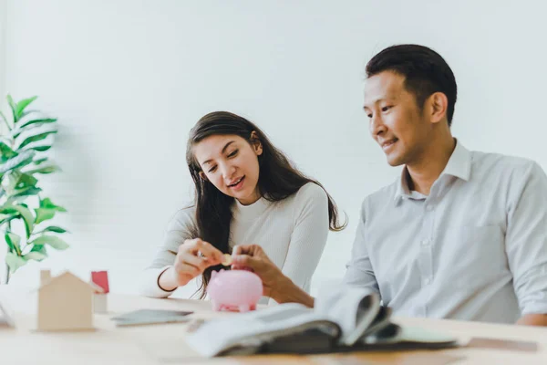 Asian couples, husbands and wives come together to design a house. To live together as a family in the future.