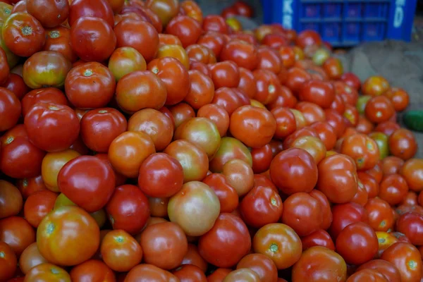 Group of fresh tomatoes in the market