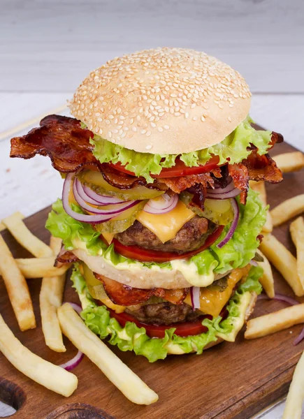 Burger With Beef, Bacon, Tomato, Cheese, Lettuce and Onion