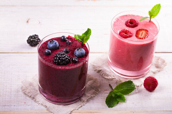 Summer berries smoothie garnished with mint