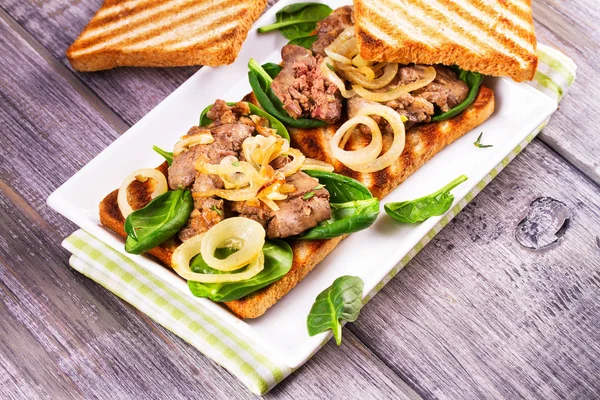 Chicken Liver, Spinach and Onion Sandwiches on White Plate