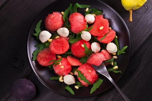 Watermelon, mozzarella and arugula salad — Stock Photo, Image