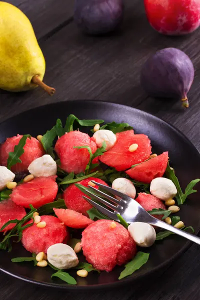 Watermelon, mozzarella and arugula salad — Stock Photo, Image