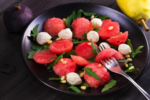 Watermelon, mozzarella and arugula salad — Stock Photo, Image