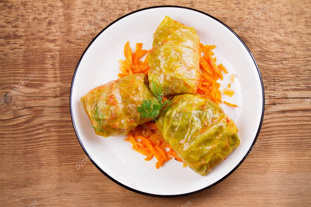 Cabbage rolls with meat; rice and vegetables. Stuffed cabbage leaves with meat. Dolma; sarma; sarmale; golubtsy or golabki
