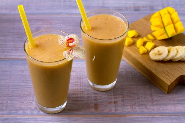 Mango banana smoothie juice jug, paths Stock Photo by maxsol7