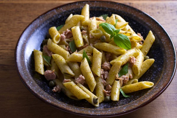 Tuna, basil and caper penne. Pasta with tuna fish