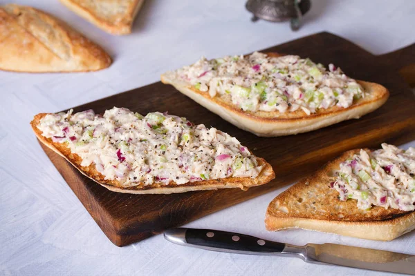 Tuna salad sandwiches on serving board. Healthy nutrition food